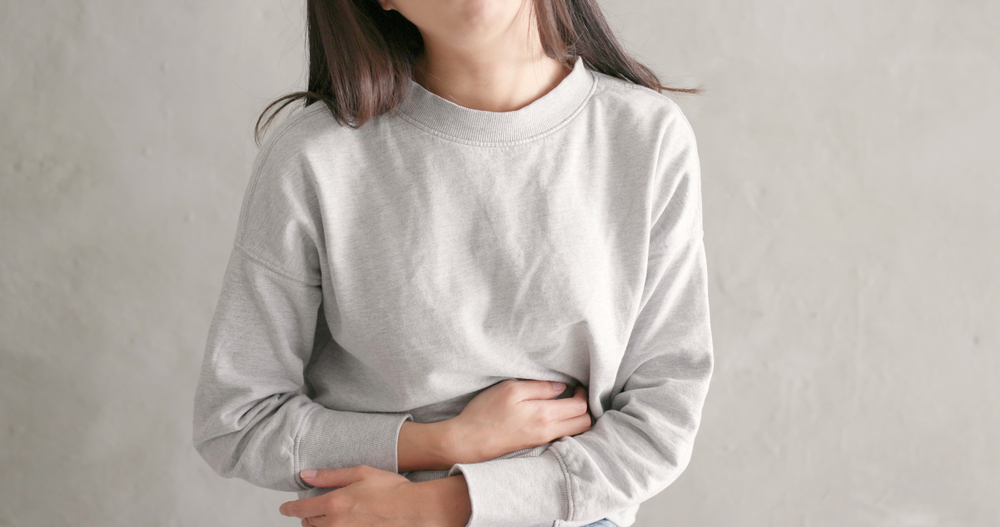 Woman,Suffer,From,Stomach,Pain
